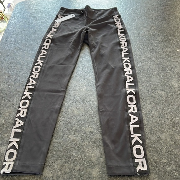 Koral Dynamic Duo Blackout Leggings in black with KORAL down the legs BNWT​ - Picture 4 of 6